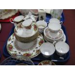 A Royal Albert Old Country Roses Quartz Clock, bowls, jug, Paragon Country Lane part tea service,