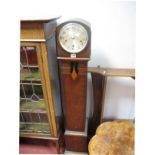 A 1920's Oak Grandmother Clock, (no pointers); together with a pine wall rack.