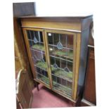 An Early XX Century Mahogany Display Cabinet, with heart decoration to leaded glazed doors, (one