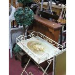 An Iron Patio Plant Table, faux ivory ornament, pine rack.