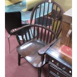 A Stained Wooden Windsor Armchair, with spindle supports to hoop back, turned legs united by