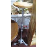 A Silver Painted Iron Pedestal Table.