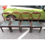 A Set of Four XIX Century Mahogany Balloon Back Dining Chairs, with straight fronts, drop-in