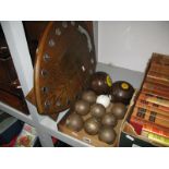 A Large Circa Mid 1900's Oak Shield Trophy, a pair of vintage bowls, a set of boules and a porcelain