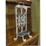 An Early XX Century Painted Cast Iron Sick Stand, with a scroll work top, S scroll bracket