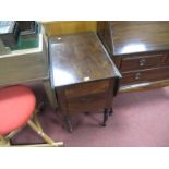An XVIII Century Mahogany Washstand, with drop leaves, hinged top with drawer and cupboard to