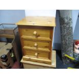 A Pine Three Drawer Chest, with turned handles and stepped base, 48.5cm wide.