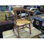 A Child's Windsor Chair, with a low back turned rail supports, turned legs, united by 'H'