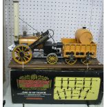 A 3½inch Gauge Live Steam Model of Stephensons Rocket with Tender, by Hornby unboxed with some signs