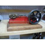 A Stuart Horizontal S50 Mill Steam Engine, 8½ inch base mounted on wooden plinth.