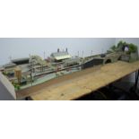 A "OO" Gauge Model Railway Diorama Layout, (in two sections) features include station building,