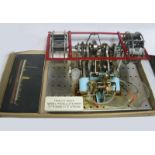 An Engineered Live Steam Model of an Unusual Twin Cylinder Paddle Steamer Engine, with dummy
