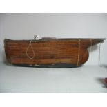 An Early to Mid XX Century Clinker Built Pond Yacht with Single Mast, lead keel and fixed rudder