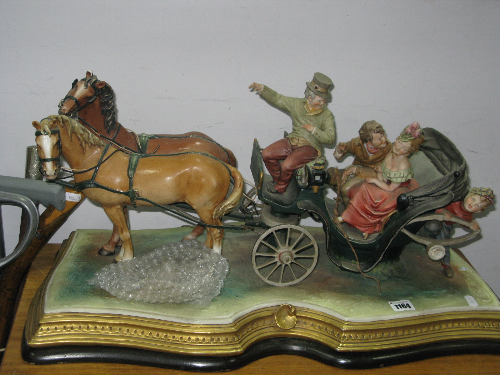 Capo di Monte - The Carriage Figure By Bruno Merli, on shaped base, 65cm wide (damages).