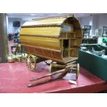 A Handmade Gypsy Caravan, in contrasting shades of wood. approximately 16inches long and 16inches
