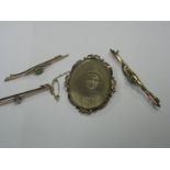 An Oval Locket Brooch, together with three bar brooches collet set. (4)