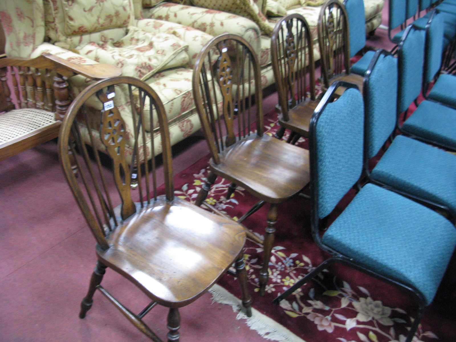 A Set of Four XIX Century Style Ash - Elm Windsor Chairs, with hooped back, rail supports, pierced