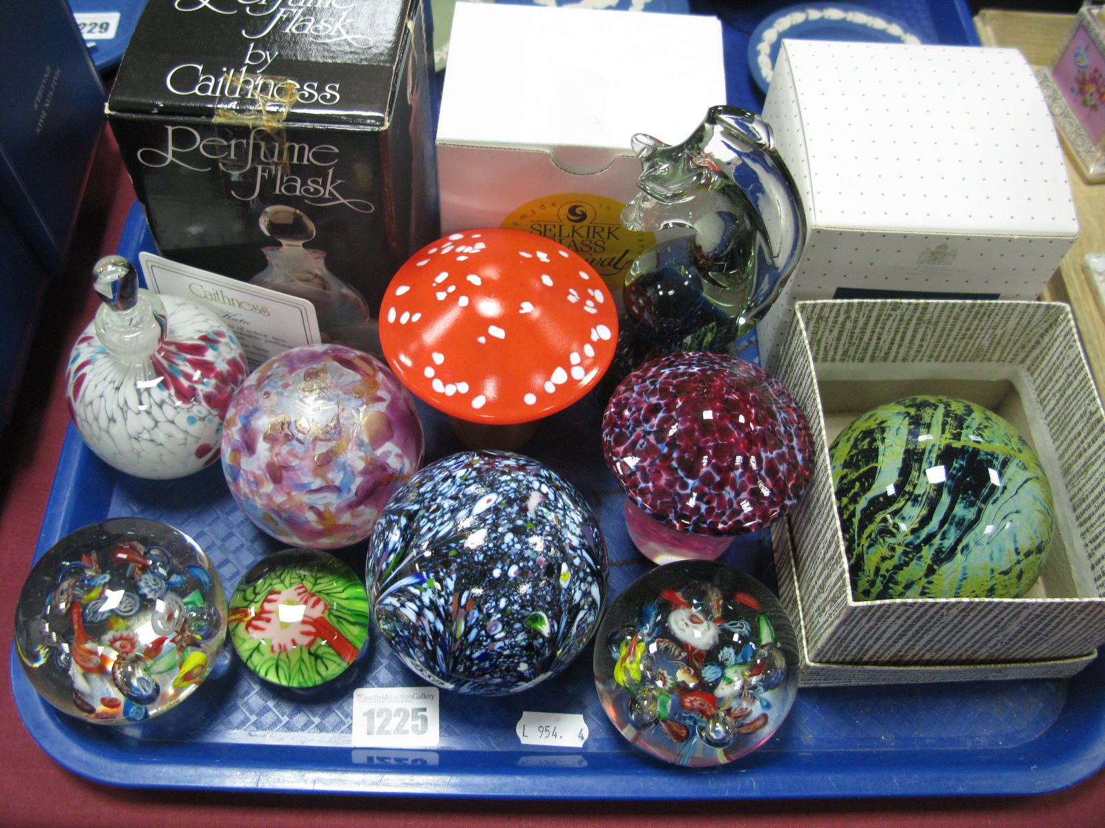 A Caithness 'Katie' Perfume Flask, Mdina, Isle of Wight, and other glass paperweights:- One Tray