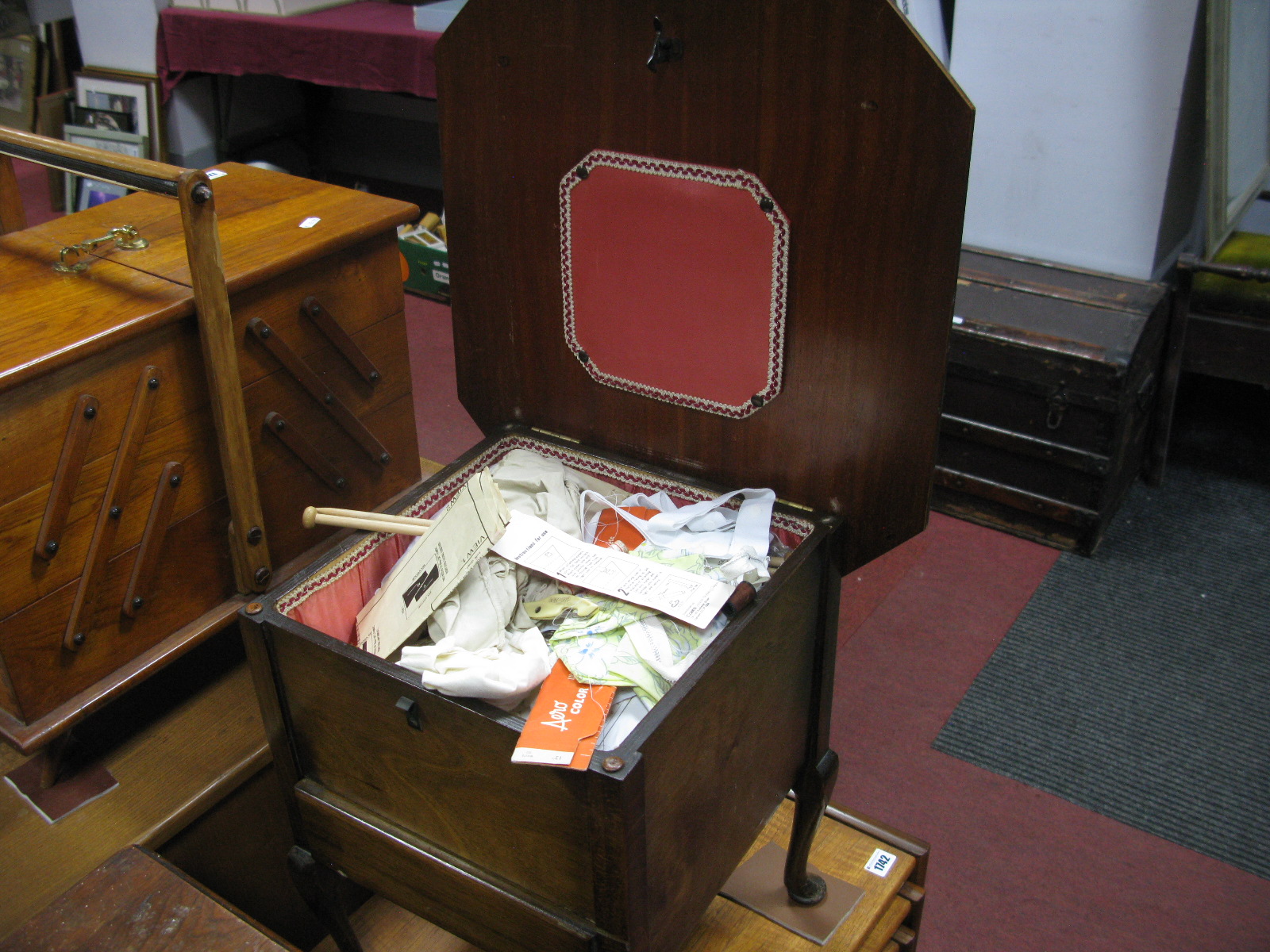 A Mid XX Century Walnut Sewing Table, with contents.