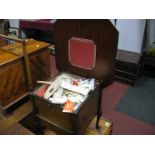 A Mid XX Century Walnut Sewing Table, with contents.