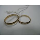 A Plain Wedding Band, inscribed inside and dated "31.10.56"; together with another, bearing the