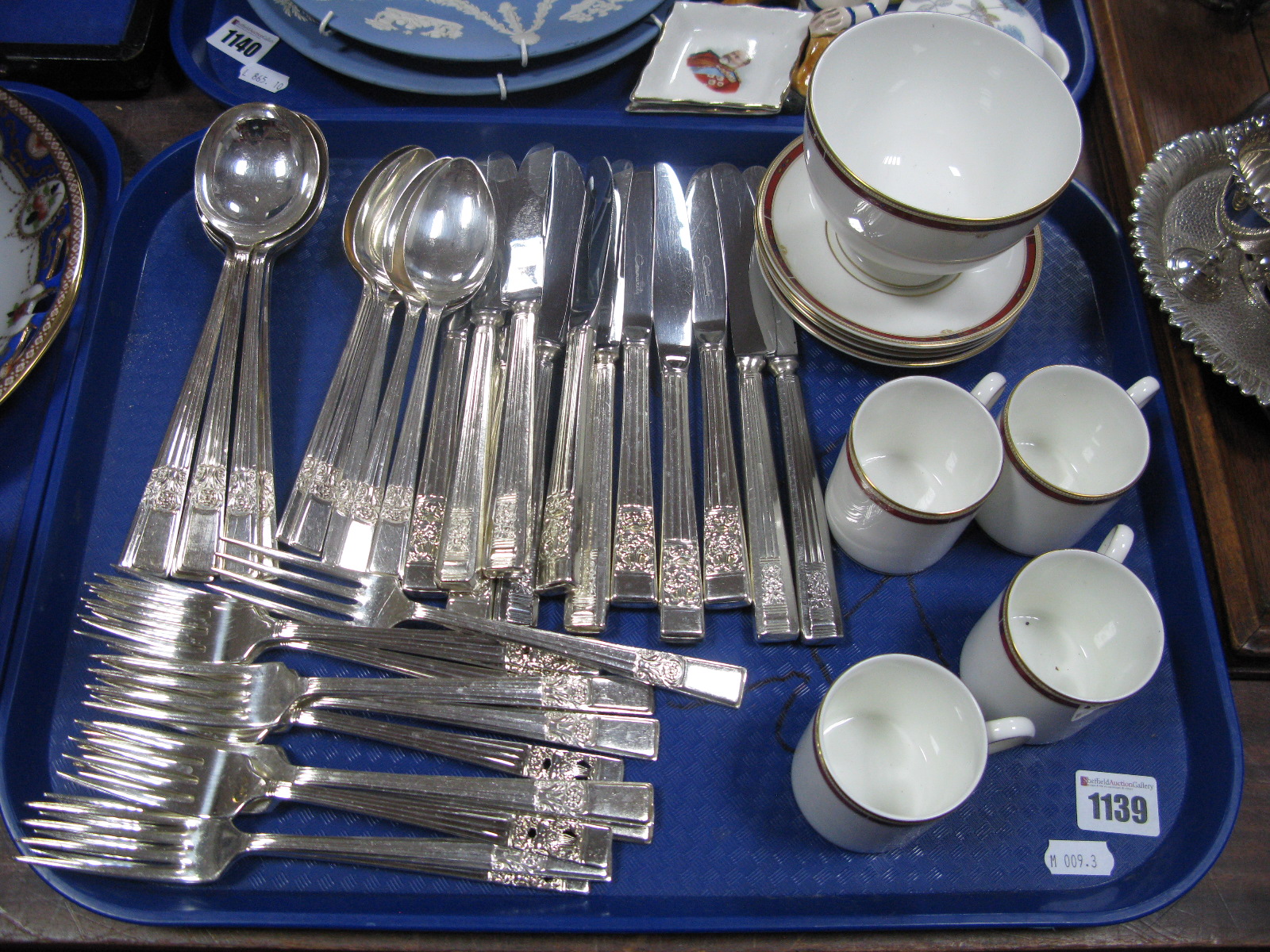 Wedgwood China Coffee Cans, sugar bowl, saucers, Viners cutlery:- One Tray