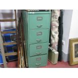 A Four Drawer Metal Filing Cabinet.