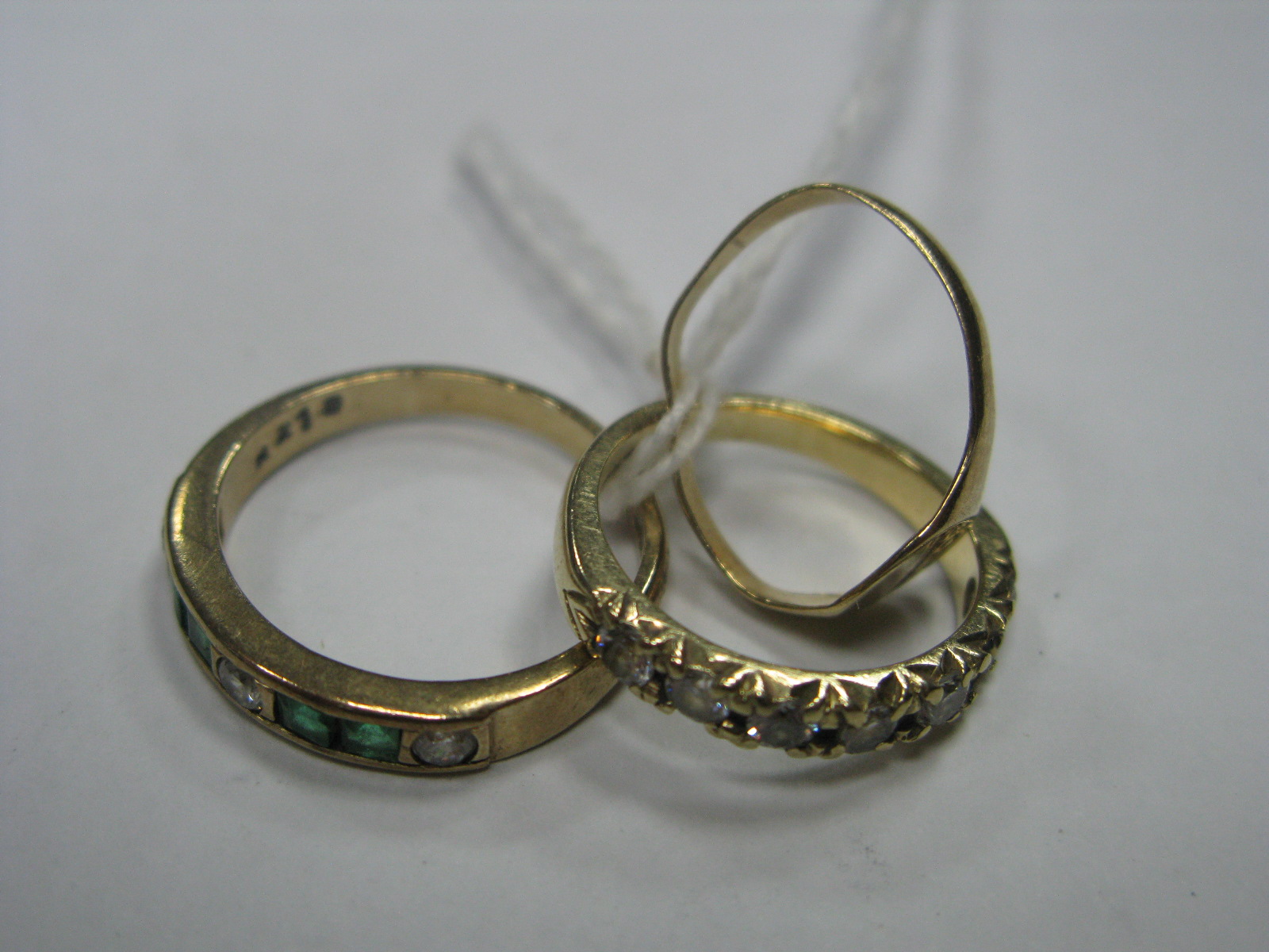 A 9ct Gold Half Eternity Style Band, (one stone missing); together with another 9ct gold ring,
