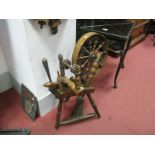 A XIX Century Ash Spinning Wheel, wheel with turned supports, on turned legs, foot pedal.