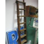 An Early 1900's Two Section Library Ladder, with adjustable locking mechanism.