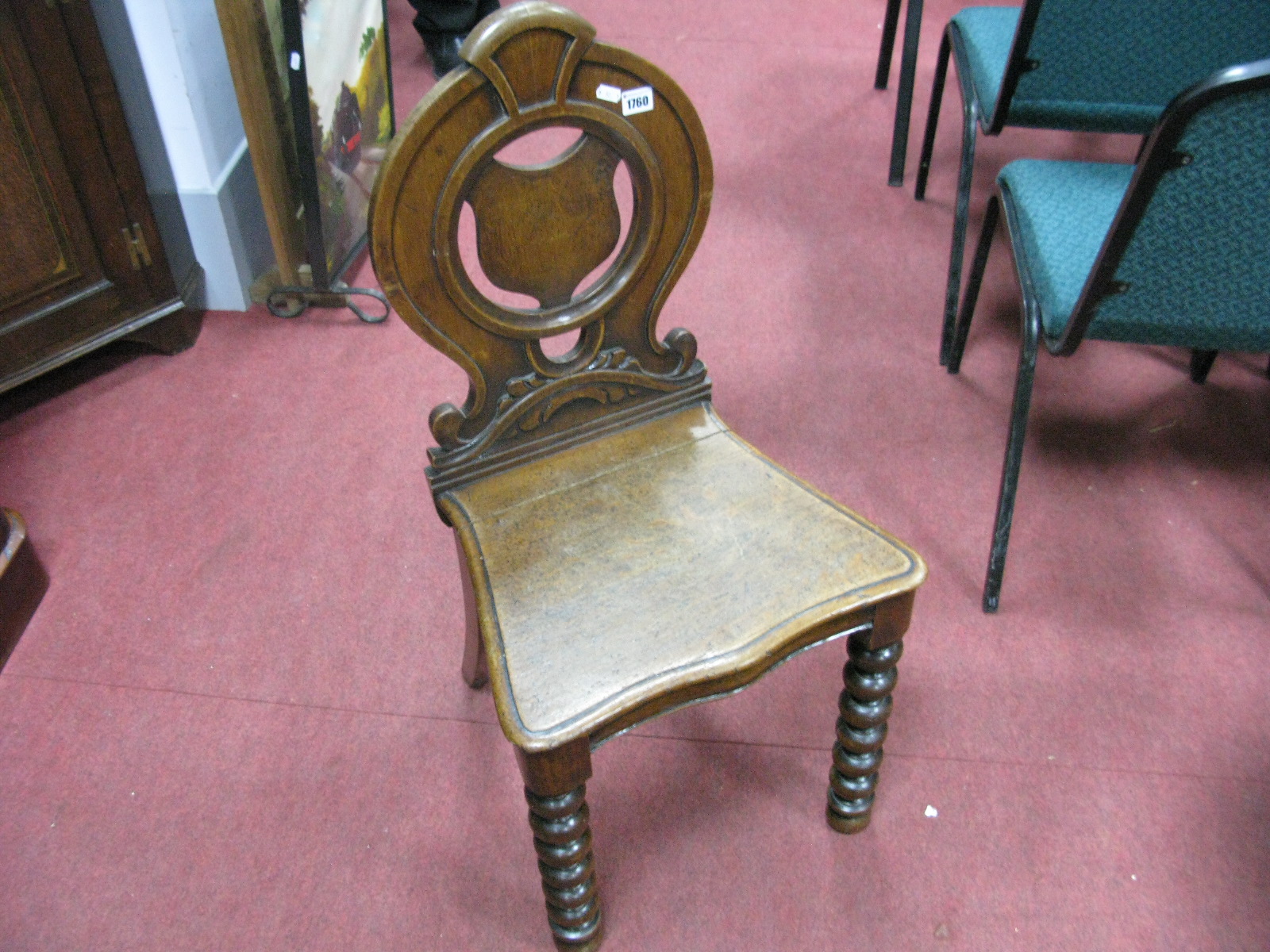 A XIX Century Oak Hall Chair, with shield back, and bobbin legs.