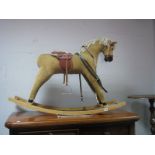 A Child's Rocking Horse.