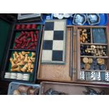 An Oak Cased Travelling Games Box, with chess, dominoes, draughts etc, plus another.