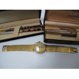 A Sheaffer Pen Set, Cloisonné style pen and letter opener set and a gent's Rotary wristwatch.