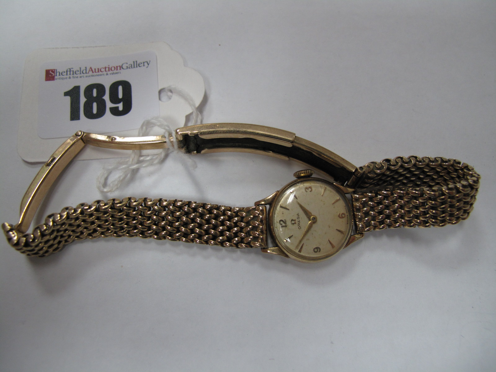 Omega; A 9ct Gold Cased Ladies Wristwatch, the signed dial with dagger markers and Arabic