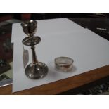 A Hallmarked Silver Candlestick, Birmingham 1921; together with a hallmarked silver napkin ring,