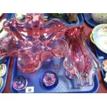 An Art Glass, ribbed and wasted cranberry and clear glass vase, a similar footed bowl, a