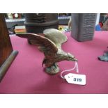 A Car Mascot, in the form of an eagle, in brass, similar to a 1934 Alvis Sports, 10.5cm high.