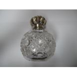 A Victorian Hallmarked Silver Topped Cut Glass Scent Bottle, with screw top.