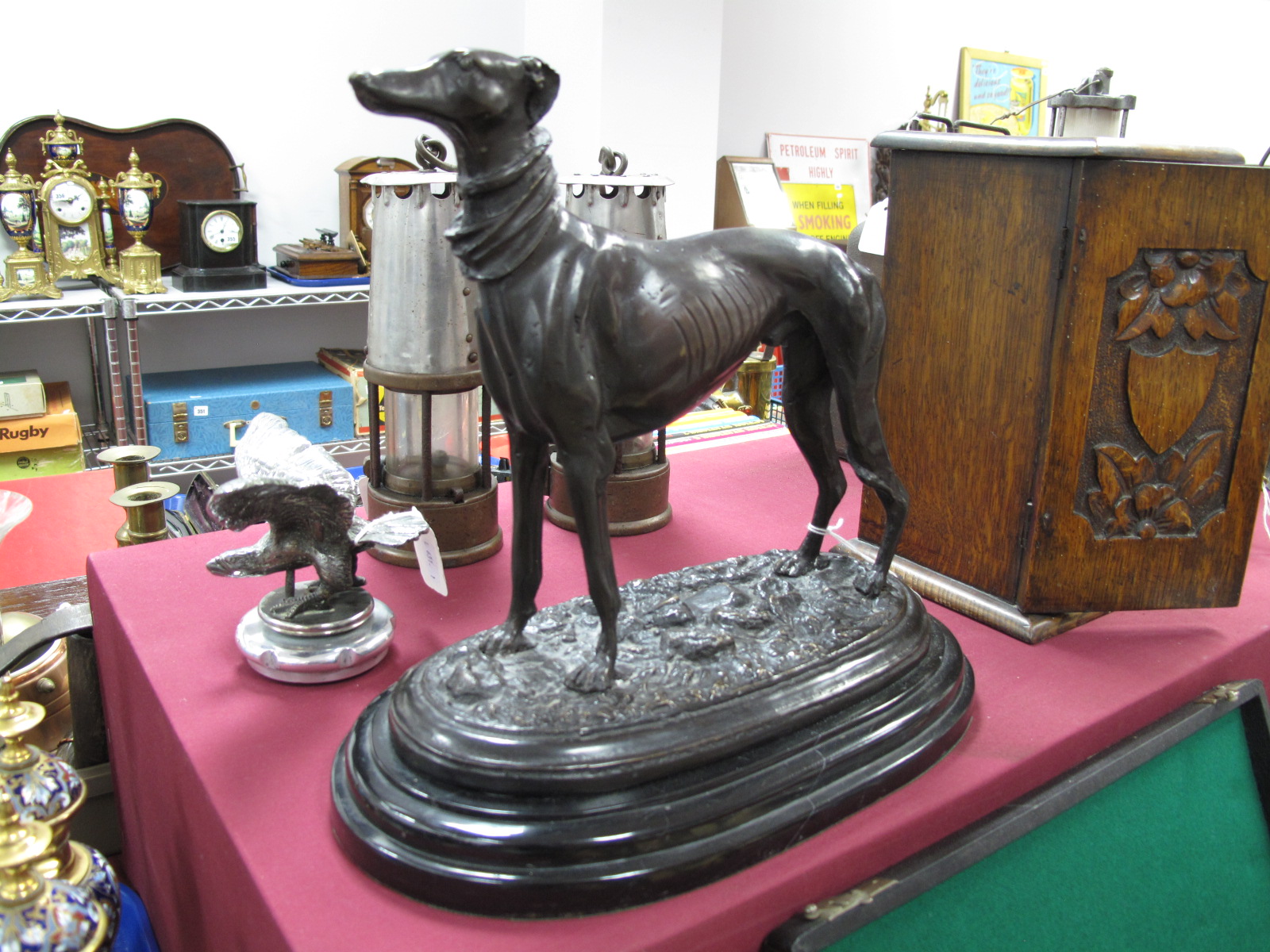 After Mene, Circa Late XX Century Bronzed Metal Study of a Greyhound, on oval stepped base, 32cm