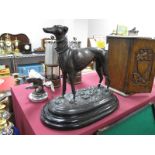 After Mene, Circa Late XX Century Bronzed Metal Study of a Greyhound, on oval stepped base, 32cm