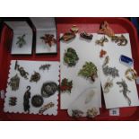 A Collection of Assorted Costume Brooches, including hanging monkey, salamander, berries and leaves,