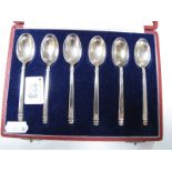 A Set of Six Hallmarked Silver "British Hallmarks" Coffee Spoons, in original fitted case.