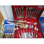 A Canteen of Oneida Cutlery, Granton stag handled steak knives and forks, carving set.
