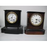 A XIX Century Ebonised Mantel Clock, with enamel dial, Roman numerals, plinth base; together with