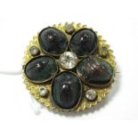 A XIX Century Circular Locket Back Brooch, collet set to the front with scarab beetles and