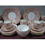 A Shelley Chintz Tea Service, pattern number H12609/55, Kent shape cups, decorated with pink