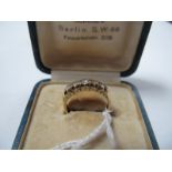 An 18ct Gold Five Stone Diamond Ring, graduated set (one stone chipped).