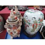 An Oriental Pottery Ginger Jar, of ovoid form, featuring three figures in a garden scene, 30cm high;