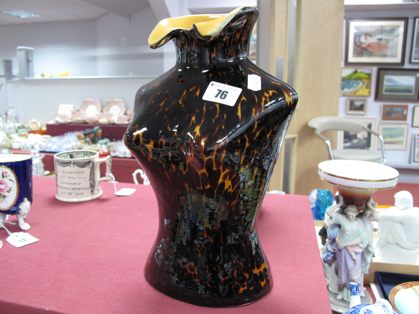 A Mottled Glass Vase, as a female torso, 30cm high.